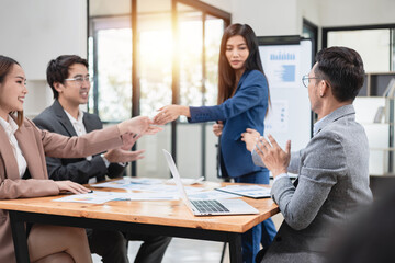 Asian business teamwork working with analysis report and advisor showing plan, Financial analysis and Marketing teamwork concept.