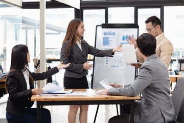 Asian business teamwork working with analysis report and advisor showing plan, Financial analysis and Marketing teamwork concept.