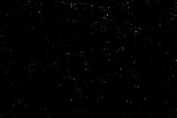 Chaotic white star bokeh on black background. falling blurry bokeh snow overlay, starry sky. white spot and drops. abstraction