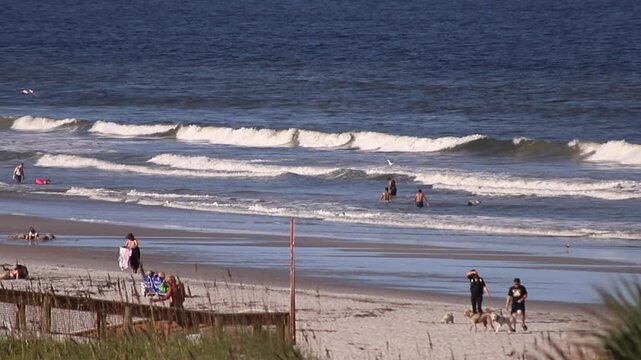 JAX Beach, Florida USA, 09-22-24. People having fun at the beach on a sunny Sunday!