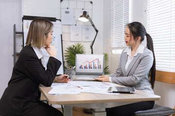 Two businesswoman working with analysis data investment plan, Business startup and marketing presentation,