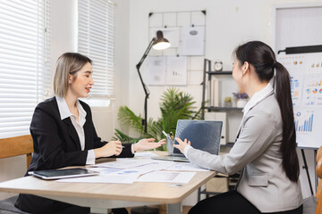 Two businesswoman working with analysis data investment plan, Business startup and marketing presentation,