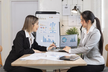 Two businesswoman working with analysis data investment plan, Business startup and marketing presentation,