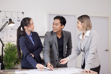 Asian business teamwork working on digital tablet with analysis report and advisor showing plan, Financial analysis and Marketing teamwork concept.