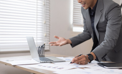 business people working with business financing accounting banking and laptop with finances analysis report at desk in office. 