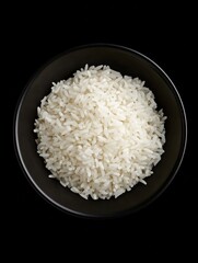 Bowl of white rice on a black background banner, top view.  - ai