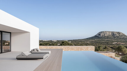 Fototapeta premium Modern villa overlooking serene landscape and infinity pool near mountains in bright daylight