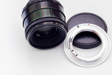 Lens and adapter for used with camera.