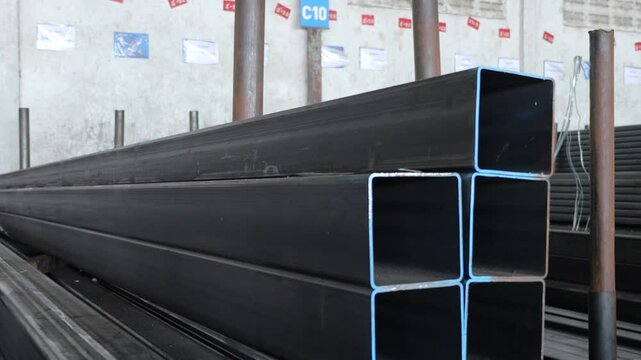 high quality Galvanized steel pipe or Aluminum and chrome stainless pipes in stack waiting for shipment in warehouse