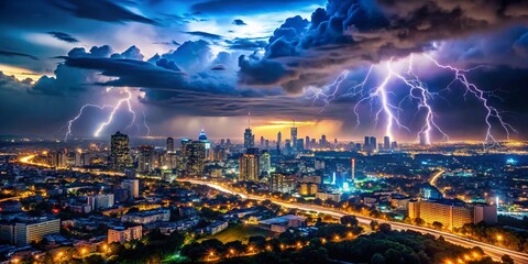 Fototapeta premium Captivating Tilt-Shift Night Cityscape Photography Featuring a Stunning Lightning Storm Over Urban Skyline with Dramatic Clouds and Illuminated Buildings