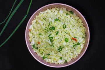 Fried rice or Nasi goreng, traditional frying rice dish from indonesia made of Precooked rice fried in a small amount of oil	
