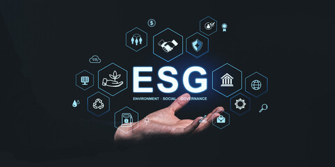 ESG Concept with Icons and Hand on Dark Background.