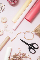 Prepare to packing present in wrapping paper.