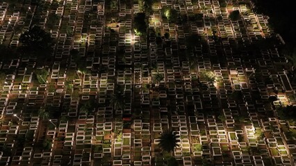 The cemetery graveyard looks beautiful with amazing drone Aerial night sky view and Lamppost light...