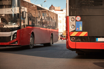 Fototapeta premium Red bus for public transportation parked on a station.