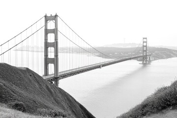 Fototapeta premium A classic view of the iconic Golden Gate Bridge in San Francisco, taken in black and white
