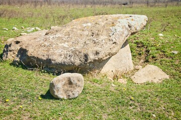 The remains of an ancient stone structure dolmen. Archaeology, 2-3 millennia BC