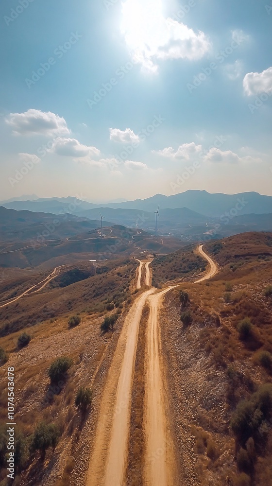 Poster an aerial view of wind turbines generating clean energy symbolizing the convergence of technology an