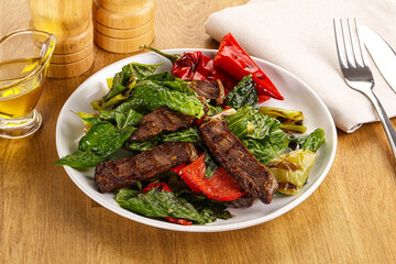 Salad with grilled beef steak