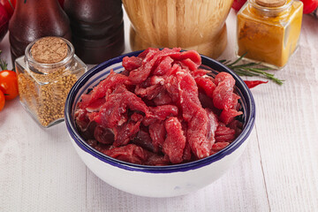Raw beef meat - sliced strips