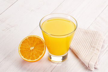 Sweet fresh orange juice in the glass