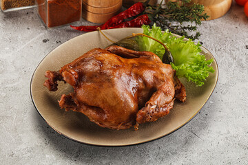 Baked small chicken with spices