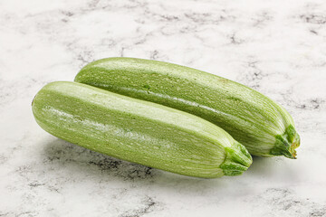 Raw green ripe zucchini vegetable