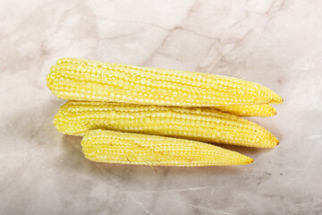 Raw sweet baby corn heap