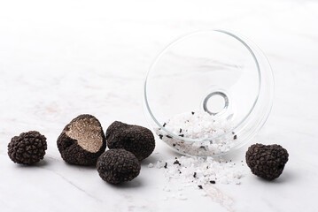 Truffle salt and truffle on the white table, how to preserve the aroma and taste of black truffle....