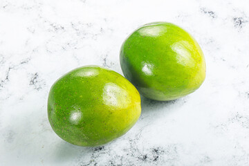 Two ripe green exotic avocado fruit
