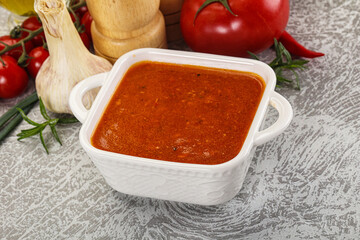 Hot tomato soup with diced chicken