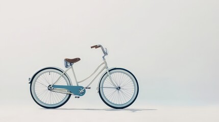 A stylish beach cruiser bicycle, featuring wide tires and a comfortable seat, is elegantly displayed against a crisp white background.