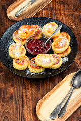 Cottage cheese pancakes or curd fritters stack.