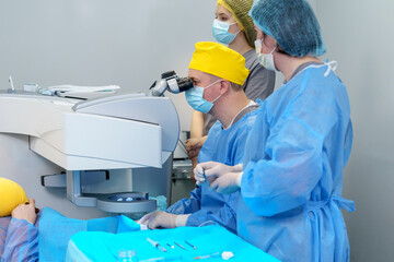 Medical Team Conducting Laser Eye Surgery with Precision