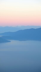Fototapeta premium view of a mountain range with a body of water