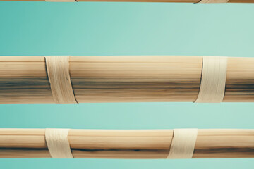 A detailed view showcasing the intricate weaving of bamboo strips with a soft light blue background, highlighting the natural texture and craftsmanship of the material.