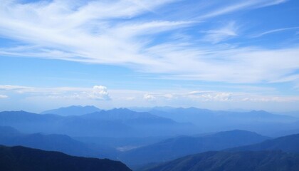 Obraz premium mountains with a few clouds in the sky