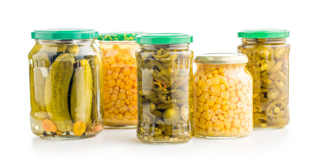Canned vegetable. Pickled corn, cucumbers and jalapeno peppers isolated on white background.