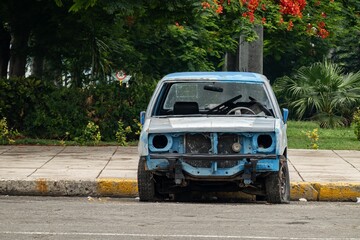 Wreck of blue Japanese pickup in streets of Havana, Cuba