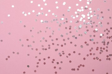 Beautiful sparkling confetti on a color background