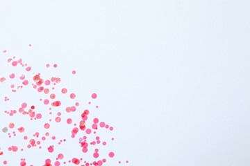 Beautiful sparkling confetti on a white background