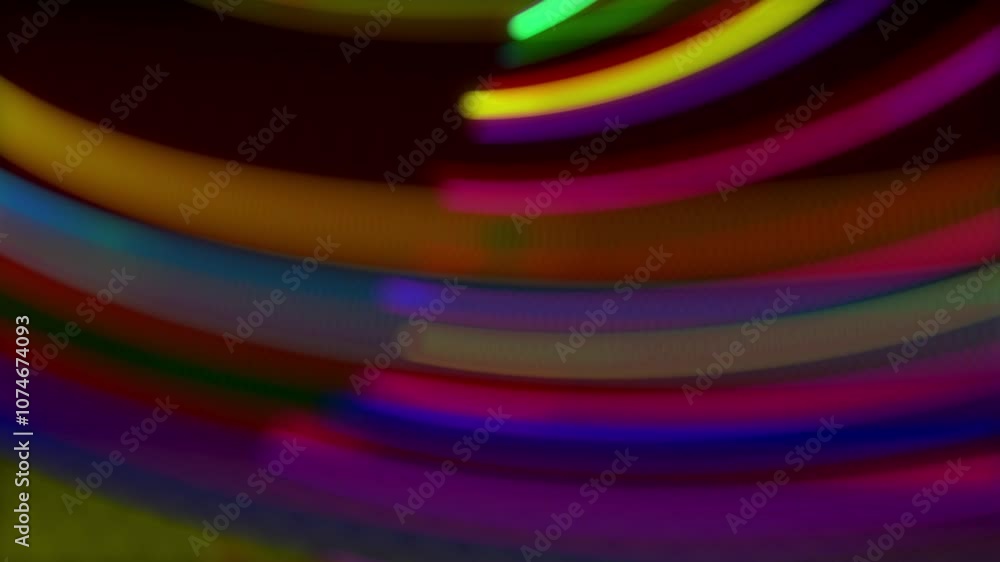 Poster colored lines or streaks swirling in spiral fly along swirling path. motion design bg of particles s