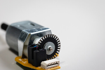 DC motor with rotary encoder disk on the back of the motor. Hobby electronics for STEM and...