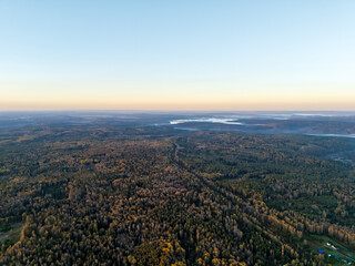 Bazhukovo, Russia. Sunrise. Early morning. Autumn landscape. Deer streams. Nature park in a wooded area. Aerial view