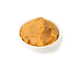 Miso paste isolated. Japanese shiro miso seasoning sauce, fermented soybean spread, brown soy cream