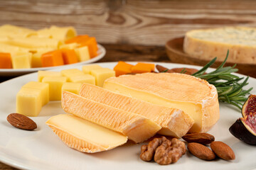 Munster cheese, stinky french cheese, creamy dairy product, gourmet food, orange cheese
