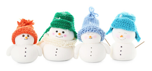 Many cute decorative snowmen isolated on white