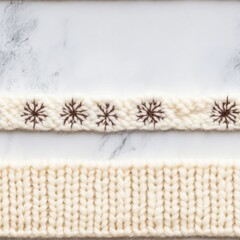 Fototapeta premium A textured cream-colored fabric with snowflake patterns and ribbed knit designs, showcasing knitting craftsmanship and winter motifs.