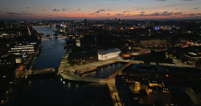 Aerial drone view of Knippel bascule bridge in Copenhagen, Denmark at night