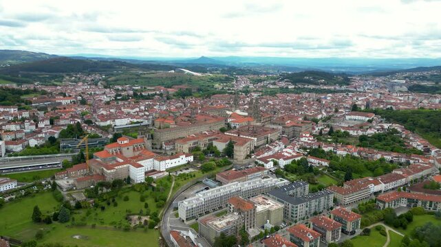 Aerial view of Santiago de Compostela city. Cathedral of Santiago. The cathedral is the reputed burial place of Saint James the Great, one of the apostles of Jesus Christ. Travel destination. Forward